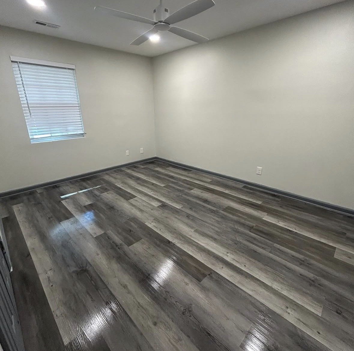 Clean Sweep Services Portland Oregon — empty bedroom vinyl floors move in portland